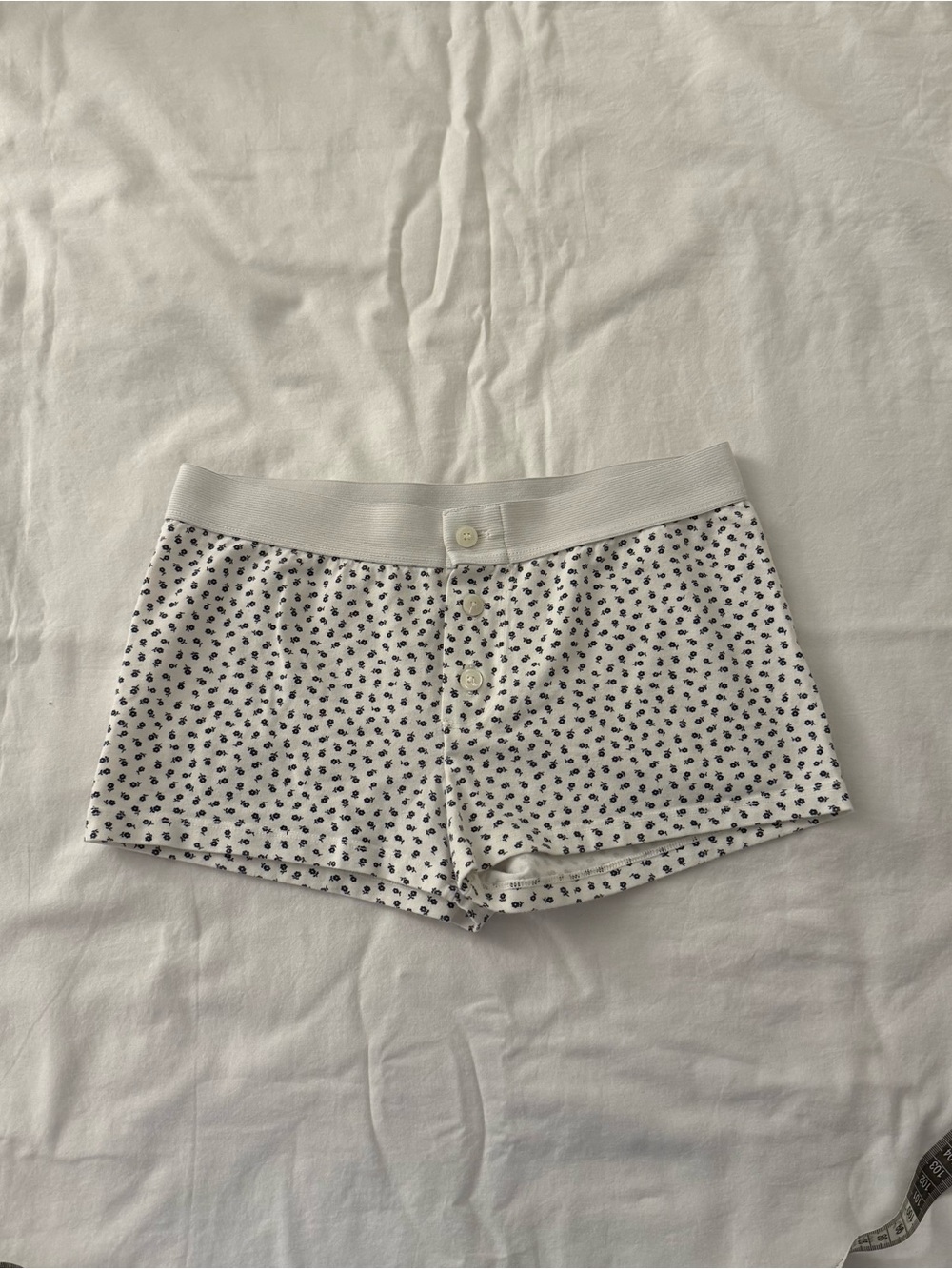 Brandy Melville white cotton shorts with black flowers